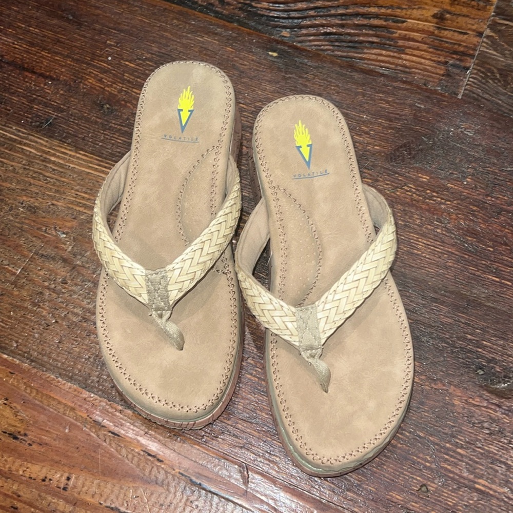 Never worn!! Volatile flip flops!